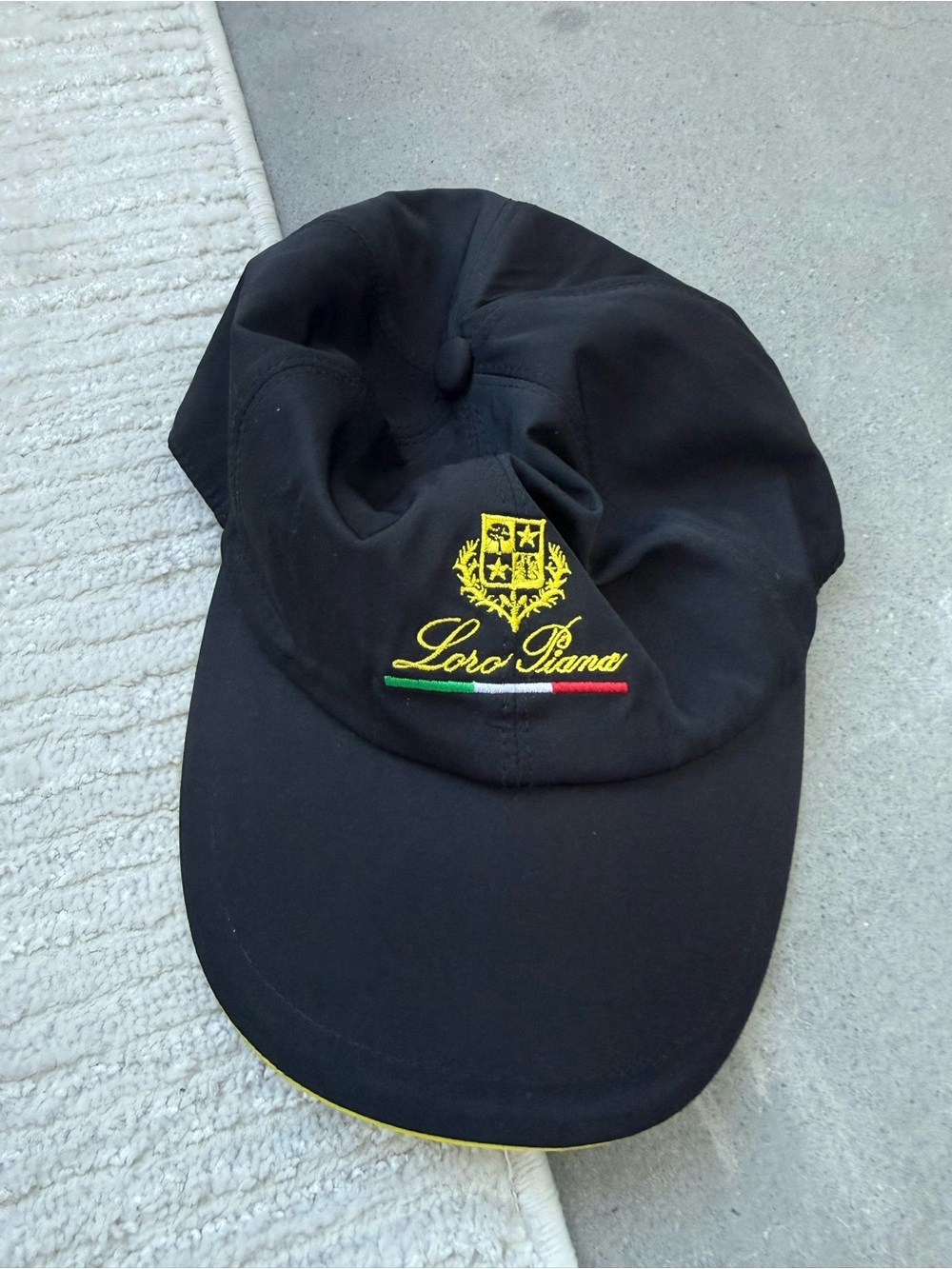 Loro Piana Black Cap with Yellow Crest and Tricolor Stripe